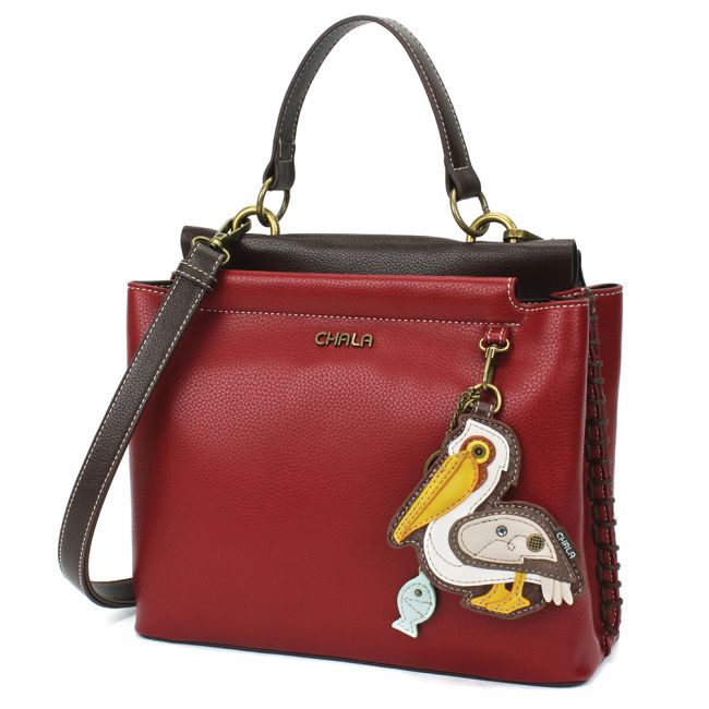 Chala Charming Satchel Pelican is perfect for all overs of the sea and ocean. Adorable Pelican Handbag you're sure to love.