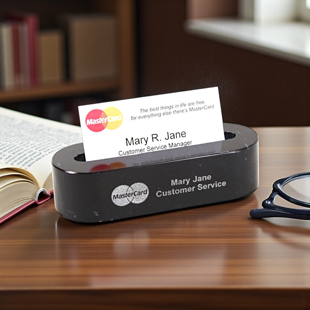 Solid Black Marble Engraved 'Mary R. Jane' and Master Card Logo on a wooden surface.