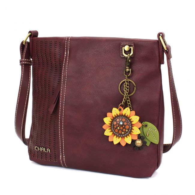 CHALA Laser Cut Crossbody Purse with Sunflower Keychain a beautiful handbag. This sunflower crossbody is the most adorable purse you'll ever own.