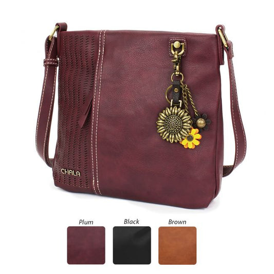 Chala Laser Cut Metal Sunflower Purse in Plum. The most adorable crossbody bag you'll ever own.