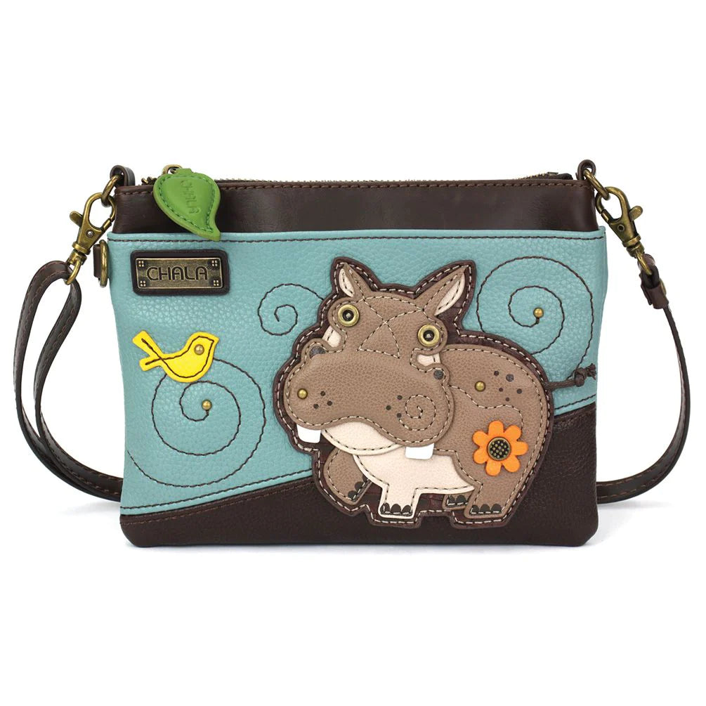 Our Chala Mini Crossbody is the most adorable bag you'll ever own. The hippo that adorns the front is just adorable!
