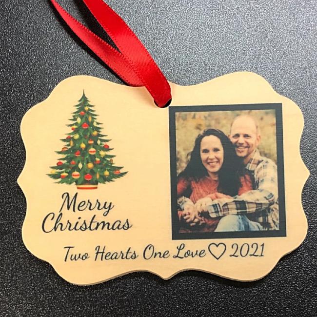 What a wonderful way to commemoriate the special couple in your life with a custom Christmas Ornament with picture.